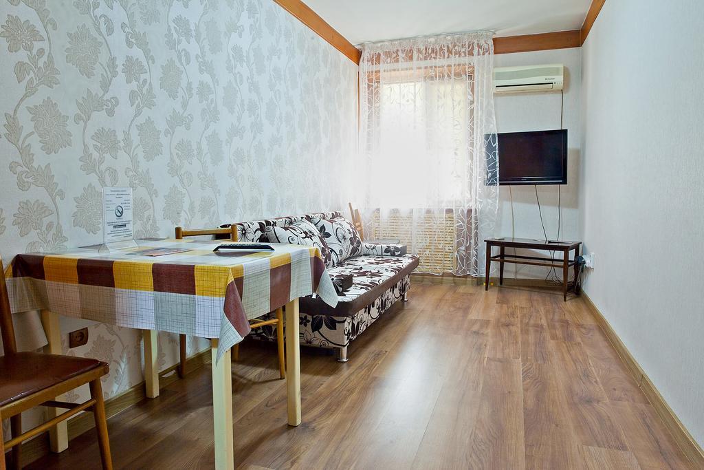Lessor Apartments Алма Ата Стая снимка