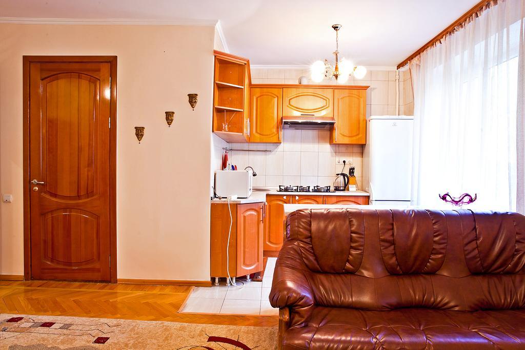 Lessor Apartments Алма Ата Стая снимка