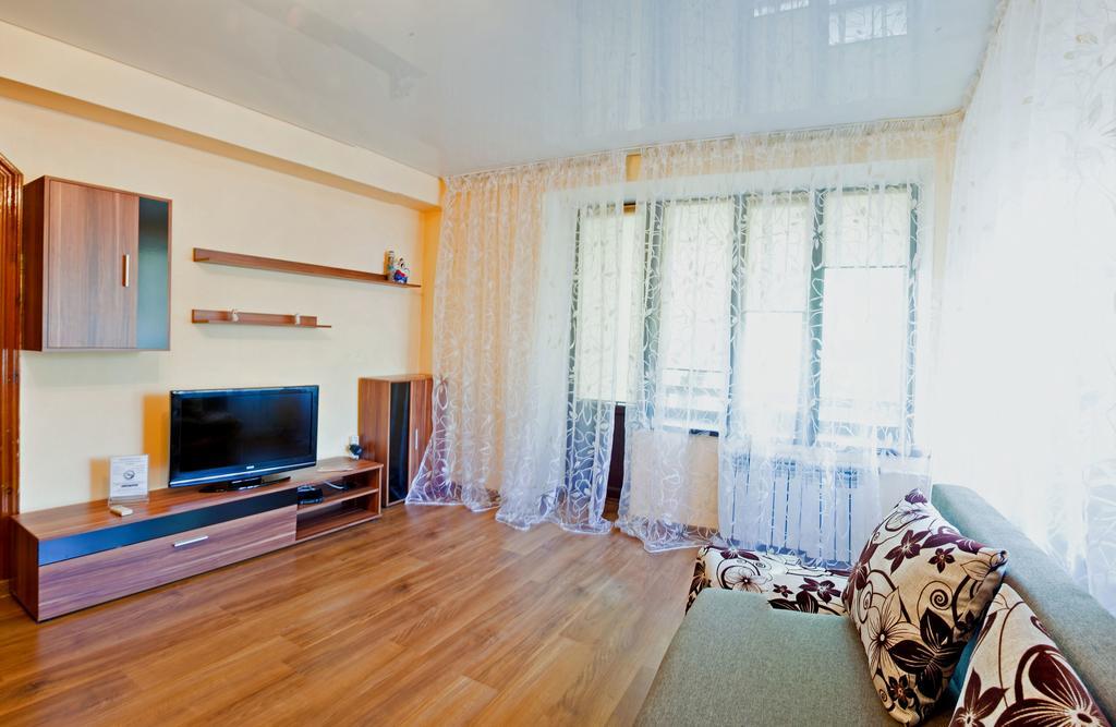 Lessor Apartments Алма Ата Стая снимка