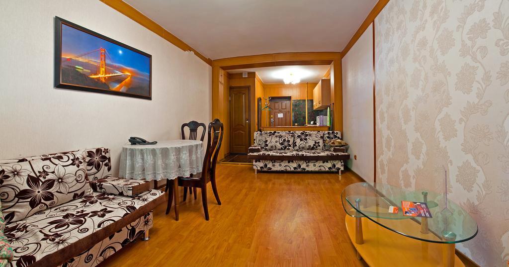 Lessor Apartments Алма Ата Стая снимка